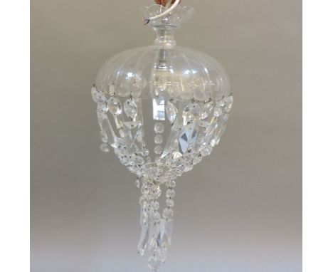 A glass ceiling light, with prismatic clips, 24.5cm diameter