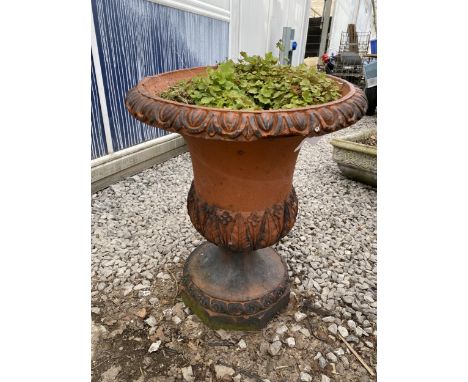 A VINTAGE TERRACOTTA URN PLANTER 