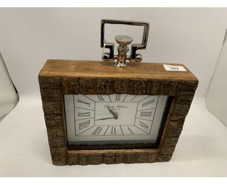 A WOODEN ,CHARLES WILLIAMS' MANTLE CLOCK HEIGHT 20CM 