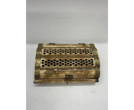 A VINTAGE BRASS AND BONE LIDDED BOX 