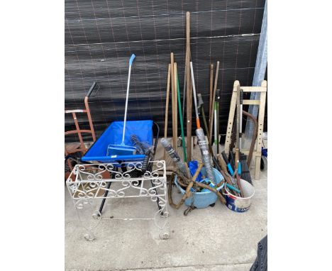 A LARGE ASSORTMENT OF GARDEN TOOLS TO INCLUDE BRUSHES, SHEARS AND A FOLDING WHEEL BARROW ETC 