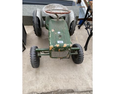 A VINTAGE SHARNA PLASTIC CHILDRENS RIDE ALONG TRACTOR 