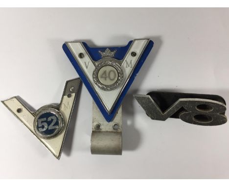 TWO VINTAGE VETERAN MOTOR CLUB BADGES 40 YEARS AND 52 YEARS AND A V8 LOGO 