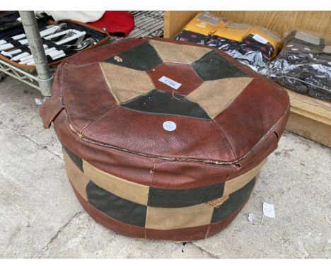 A VINTAGE LEATHER FOOT STOOL 
