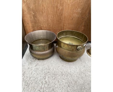 A LARGE BERASS LOG BUCKET AND A FURTHER BRASS PLANTER 