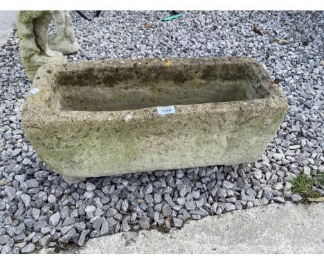 A RECONSTITUTED STONE TROUGH PLANTER 