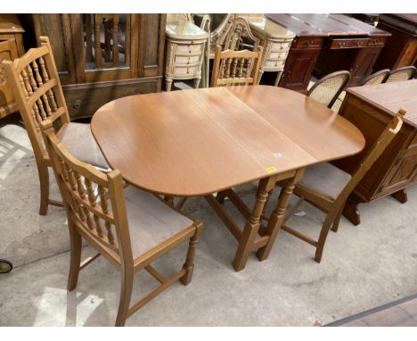 A MODERN OAK GATE LEG DINING TABLE AND FOUR CHAIRS 