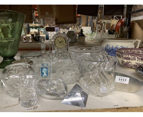 A QUANTITY OF CUT GLASS ITEMS TO INCLUDE A WATERFORD CRYSTAL CLOCK, ORREFORS GLASSBOWL - CHIP TO THE RIM, PLUS ROSE BOWLS, BO