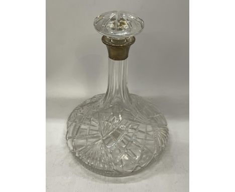 A CUT GLASS SHIPS DECANTER WITH HALLMARKED SILVER COLLAR 