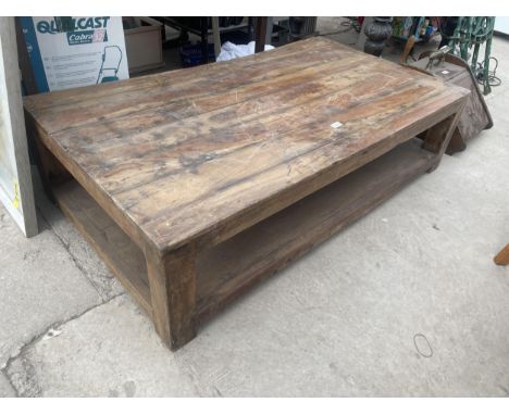 A VINTAGE INDIAN HARDWOOD LOW COFFEE TABLE WITH LOWER SHELF 