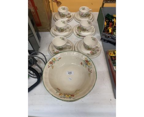 A QUANTITY OF VINTAGE ALFRED MEAKIN CUPS SAUCERS AND SIDE PLATES WITH A FLORAL PATTERN PLUS A LARGE BOWL AND DINNER PLATES 