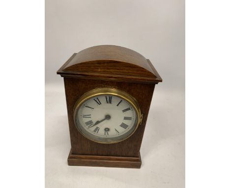 A VINTAGE GERMAN OAK MANTLE CLOCK 