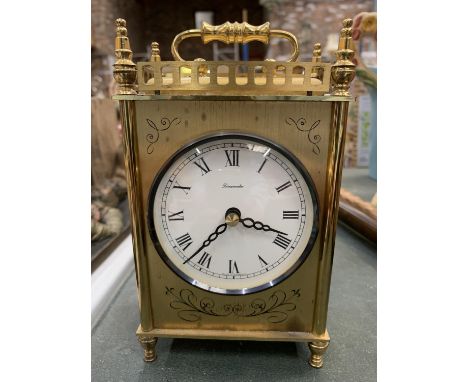 A BRASS MANTLE CLOCK HEIGHT 15CM 