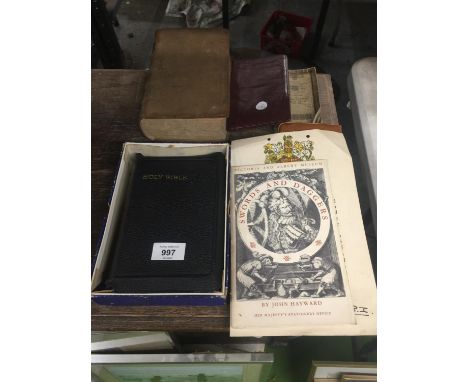 A VINTAGE BAILEY'S DICTIONARY TOGETHER WITH A HOLY BIBLE, THE MAN-EATERS OF TSAVO BY J H PATTERSON BOOK, ETC., 