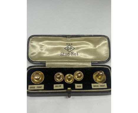 FOUR 9 CARAT GOLD STUDS AND AN 18 CARAT GOLD IN A VINTAGE PRESENTATION BOX 