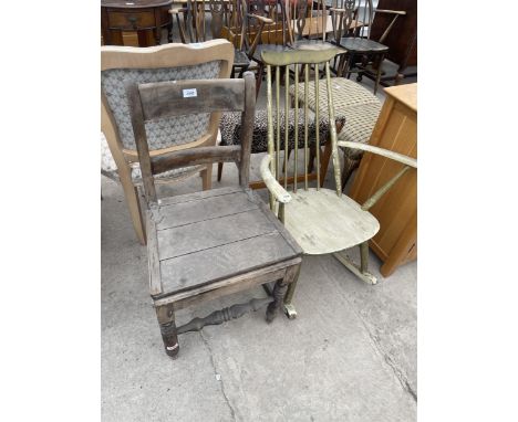 A PAINTED ERCOL STYLE ROCKING CHAIR AND A COUNTRY COMMODE CHAIR 