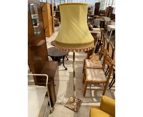 A 20TH CENTURY ONYX AND BRASS STANDARD LAMP COMPLETE WITH SHADE 