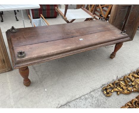 A VINTAGE INDIAN HARDWOOD COFFEE TABLE ON TURNED LEGS 