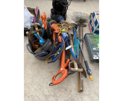 A LARGE QUANTITY OF GARDEN TOOLS TO INCLUDE ELECTRIC STRIMMERS, RAKES AND SHEARS ETC 