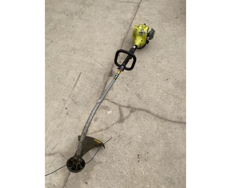 A RYOBI PETROL ENGINE GRASS STRIMMER 