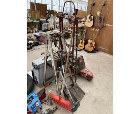 AN ASSORTMENT OF TOOLS TO INCLUDE TWO SETS OF LADDERS, SHOVELS AND SPADES ETC 
