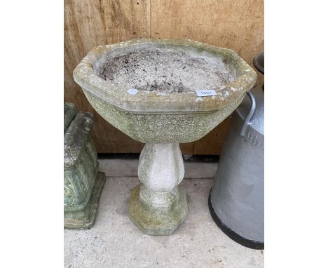 A RECONSTITUTED STONE OCTAGONAL PLANTER ON COLUMN PEDESTAL BASE (H:70CM) 