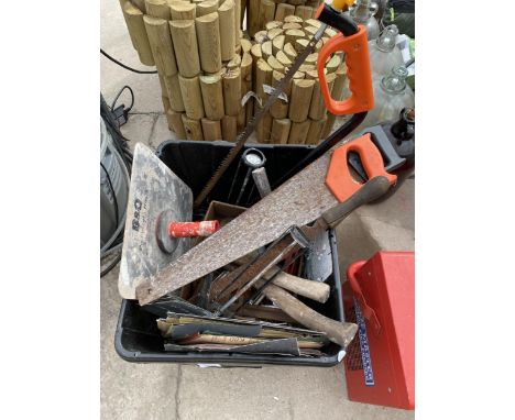 AN ASSORTMENT OF TOOLS TO INCLUDE AXES, SAWS AND FILES ETC 