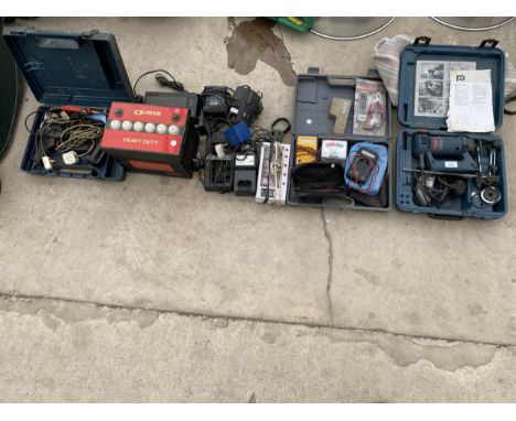 A LARGE ASSORTMENT OF TOOLS TO INCLUDE A BOSCH DRILL, ELECTRIC TESTERS AND BATTERY CHARGERS ETC 
