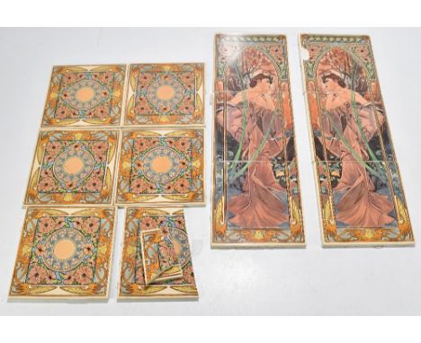 A set of six Art Nouveau-style ceramic fire tiles, each split into three panels and decorated with a maiden and signed Mucha 