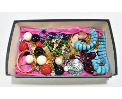 A quantity of costume jewellery including brooches, bangle, necklace, etc