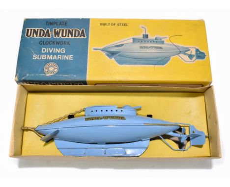 SUTCLIFFE ENGLAND; a boxed tin plate Unda-Wunda clockwork submarine, boxed.Additional InformationComplete with key and top se