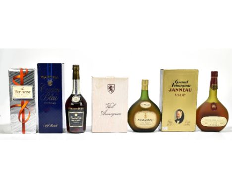 COGNAC; four mixed bottles comprising Grand Janneau VSOP, Hennessey Very Special Cognac, Martell Cordon Bleu and Napoleon Arm