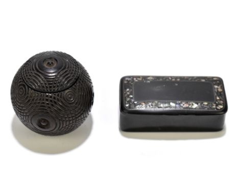 A 19th century carved ebony snuff ball, diameter 4cm, with a Victorian papier-mâché snuff box of rectangular form with mother
