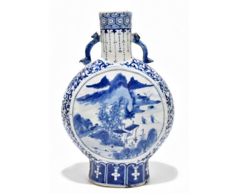 A late 19th century Chinese blue and white porcelain twin handled moon flask, decorated to the front and reverse with mountai