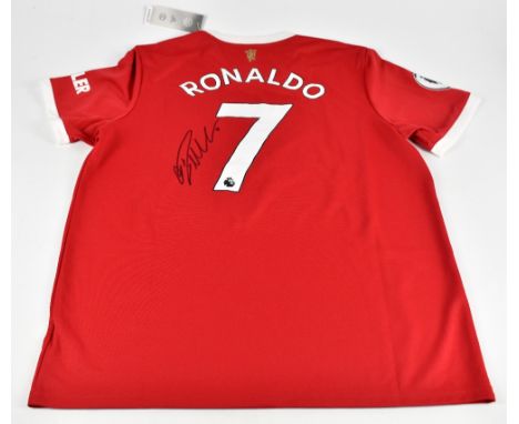 CRISTIANO RONALDO; an Adidas Manchester United 2021 home shirt, signed to reverse, size XL.
Additional InformationCreasing an