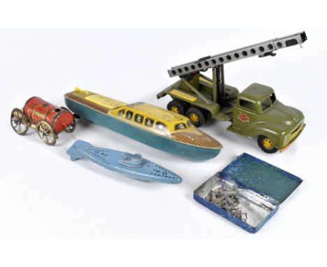 Four tin plate models including a Gama mechanic missile launcher, etc (af).Additional InformationMissile launcher is rusting 