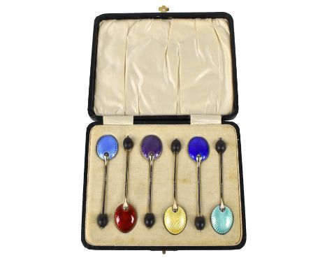 WILLIAM SUCKLING LTD; a cased set of six George V hallmarked silver teaspoons, with shell backs, each with different coloured