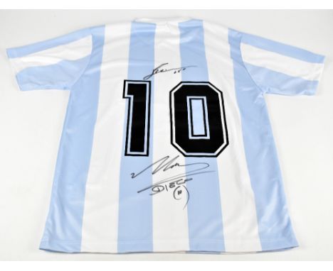 DIEGO MARADONA &amp; LIONEL MESSI; an Argentina home shirt, signed to back with printed number 10 to reverse, size large.
Add