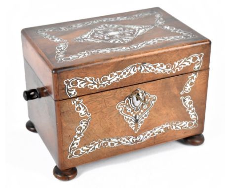 A Victorian rosewood tea caddy with mother of pearl inlaid decoration, the hinged cover enclosing two rosewood compartments, 