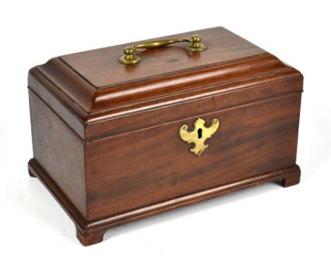 A George III mahogany tea caddy, the hinged cover enclosing three compartments, raised on bracket feet, with brass swan neck 