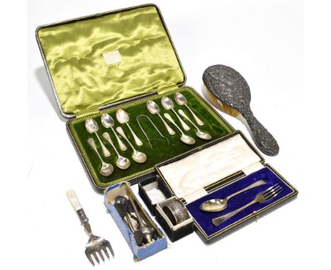 A part set of hallmarked silver spoons and sugar tongs, eleven spoons and one pair of sugar tongs in fitted box, together wit