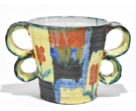 GOLDSCHEIDER; an Austrian four handled vessel of tapering form with floral decoration set with panels decorated in shades of 