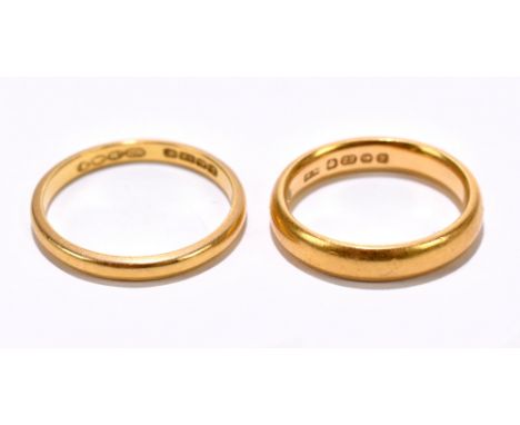 Two 22ct gold wedding bands, sizes J and N/O, 8g (2).Additional InformationBoth with general light surface patina through bei