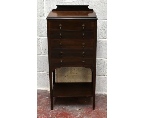 An early 20th century mahogany music chest, with five drawers and lower shelf on tapered legs, height 108cm, width 49cm, dept