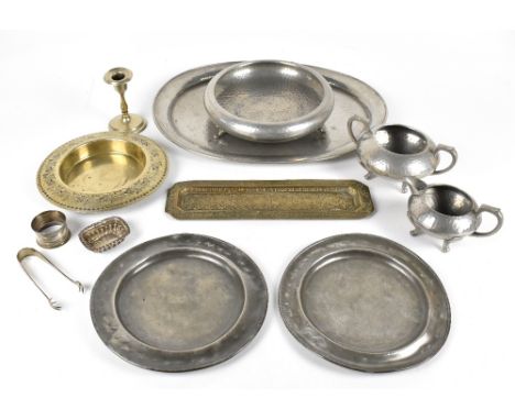 A small selection of pewter and metalware items to include and Arts and Crafts hammered pewter sugar bowl and cream jug, a ha