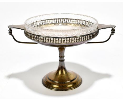 An Edwardian hallmarked silver bonbon dish with pierced rim, twin loop handles and raised on spreading circular base, Sheffie