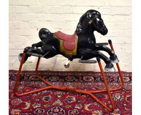 MOBO; a vintage tin rocking horse.