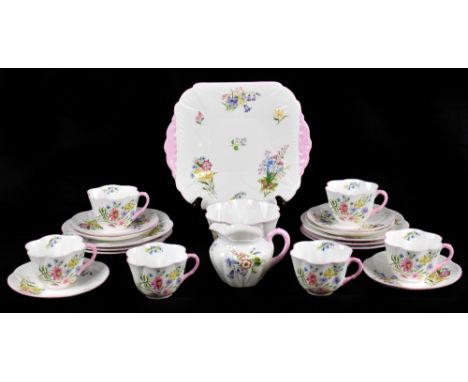 SHELLEY; a 'Wild Flowers' pattern twenty-one piece part tea service comprising six cups, six saucers, six side plates, a suga