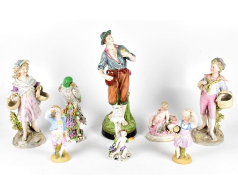 A collection of 19th century and later Continental ceramic and pottery figures, to include a Continental pottery figure of a 