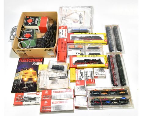 FLEISCHMANN; a quantity of OO Gauge trains and accessories including two engines model numbers 4145 and 4170, two transporter